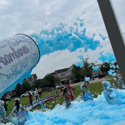 Children playing in foam bubbles at a lively foam party in Washington DC, Maryland, and Virginia, capturing the fun and excitement of the event.